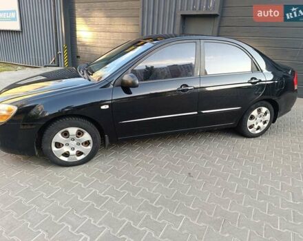 Чорний Кіа Черато, об'ємом двигуна 1.6 л та пробігом 237 тис. км за 5300 $, фото 11 на Automoto.ua
