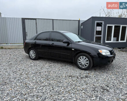 Черный Киа Черато, объемом двигателя 1.6 л и пробегом 220 тыс. км за 3300 $, фото 4 на Automoto.ua