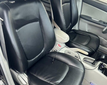 Черный Киа Черато, объемом двигателя 1.98 л и пробегом 236 тыс. км за 4100 $, фото 15 на Automoto.ua