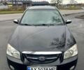 Черный Киа Черато, объемом двигателя 2 л и пробегом 232 тыс. км за 4100 $, фото 1 на Automoto.ua