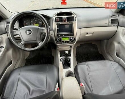 Чорний Кіа Черато, об'ємом двигуна 1.98 л та пробігом 177 тис. км за 3950 $, фото 1 на Automoto.ua