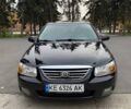 Черный Киа Черато, объемом двигателя 1.6 л и пробегом 280 тыс. км за 5250 $, фото 1 на Automoto.ua