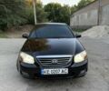 Черный Киа Черато, объемом двигателя 1.6 л и пробегом 286 тыс. км за 3500 $, фото 1 на Automoto.ua