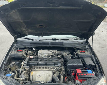 Черный Киа Черато, объемом двигателя 1.98 л и пробегом 236 тыс. км за 4100 $, фото 19 на Automoto.ua