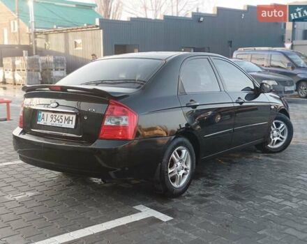 Черный Киа Черато, объемом двигателя 1.6 л и пробегом 230 тыс. км за 4250 $, фото 9 на Automoto.ua