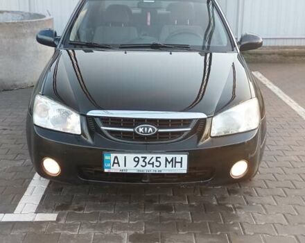 Черный Киа Черато, объемом двигателя 1.6 л и пробегом 230 тыс. км за 4250 $, фото 1 на Automoto.ua