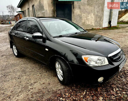 Чорний Кіа Черато, об'ємом двигуна 1.98 л та пробігом 240 тис. км за 5100 $, фото 2 на Automoto.ua