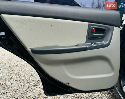 Чорний Кіа Черато, об'ємом двигуна 2 л та пробігом 319 тис. км за 4300 $, фото 15 на Automoto.ua