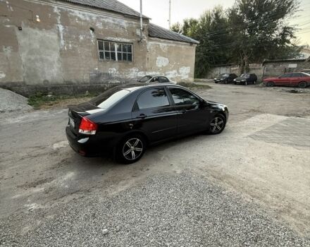 Черный Киа Черато, объемом двигателя 1.6 л и пробегом 286 тыс. км за 3500 $, фото 4 на Automoto.ua