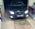 Черный Киа Черато, объемом двигателя 1.59 л и пробегом 277 тыс. км за 3400 $, фото 1 на Automoto.ua