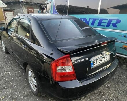 Черный Киа Черато, объемом двигателя 2 л и пробегом 240 тыс. км за 3300 $, фото 1 на Automoto.ua