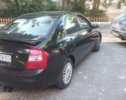 Черный Киа Черато, объемом двигателя 2 л и пробегом 220 тыс. км за 4900 $, фото 9 на Automoto.ua