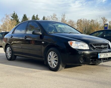 Черный Киа Черато, объемом двигателя 1.6 л и пробегом 245 тыс. км за 2850 $, фото 1 на Automoto.ua