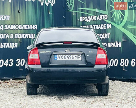 Чорний Кіа Черато, об'ємом двигуна 2 л та пробігом 319 тис. км за 4300 $, фото 6 на Automoto.ua