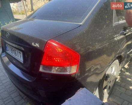 Чорний Кіа Черато, об'ємом двигуна 1.59 л та пробігом 202 тис. км за 2999 $, фото 3 на Automoto.ua