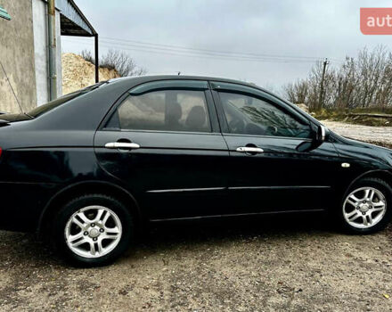 Чорний Кіа Черато, об'ємом двигуна 1.98 л та пробігом 240 тис. км за 5100 $, фото 3 на Automoto.ua