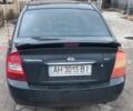 Черный Киа Черато, объемом двигателя 0 л и пробегом 321 тыс. км за 3700 $, фото 1 на Automoto.ua
