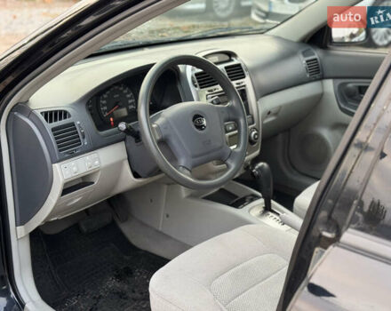 Киа Черато 2006 в Киеве на Automoto.ua Черный Киа Черато, объемом двигателя 2 л и пробегом 260 тыс. км за 4800 $, фото 8 на Automoto.ua