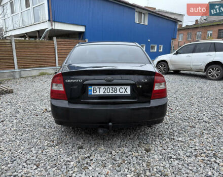 Черный Киа Черато, объемом двигателя 1.6 л и пробегом 220 тыс. км за 3300 $, фото 8 на Automoto.ua