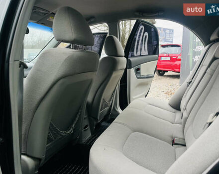 Чорний Кіа Черато, об'ємом двигуна 2 л та пробігом 319 тис. км за 4300 $, фото 12 на Automoto.ua