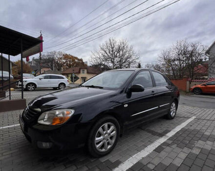 Черный Киа Черато, объемом двигателя 1.6 л и пробегом 232 тыс. км за 4300 $, фото 1 на Automoto.ua