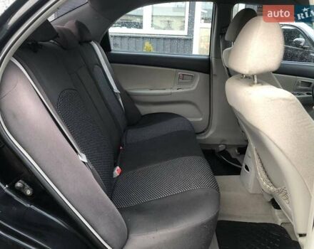 Чорний Кіа Черато, об'ємом двигуна 2 л та пробігом 177 тис. км за 4399 $, фото 21 на Automoto.ua