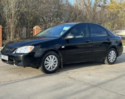 Черный Киа Черато, объемом двигателя 1.6 л и пробегом 245 тыс. км за 2850 $, фото 4 на Automoto.ua