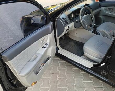 Чорний Кіа Черато, об'ємом двигуна 1.6 л та пробігом 237 тис. км за 5300 $, фото 25 на Automoto.ua
