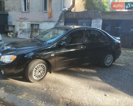 Черный Киа Черато, объемом двигателя 2 л и пробегом 220 тыс. км за 4900 $, фото 6 на Automoto.ua