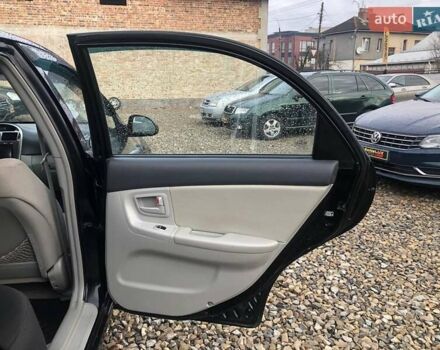 Чорний Кіа Черато, об'ємом двигуна 2 л та пробігом 177 тис. км за 4399 $, фото 18 на Automoto.ua