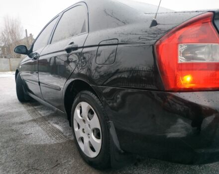 Черный Киа Черато, объемом двигателя 0 л и пробегом 210 тыс. км за 2500 $, фото 6 на Automoto.ua