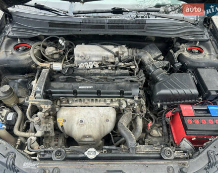 Черный Киа Черато, объемом двигателя 1.98 л и пробегом 236 тыс. км за 4100 $, фото 20 на Automoto.ua