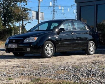 Черный Киа Черато, объемом двигателя 2 л и пробегом 268 тыс. км за 4200 $, фото 1 на Automoto.ua