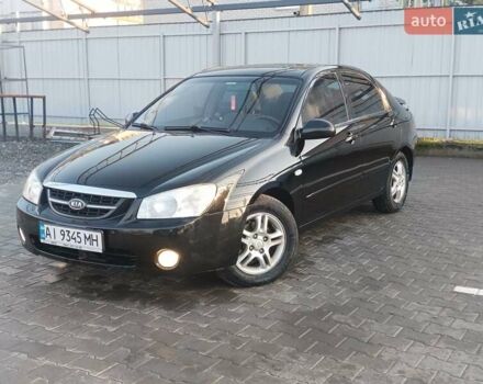 Черный Киа Черато, объемом двигателя 1.6 л и пробегом 230 тыс. км за 4250 $, фото 11 на Automoto.ua