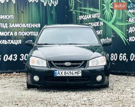 Чорний Кіа Черато, об'ємом двигуна 2 л та пробігом 319 тис. км за 4300 $, фото 3 на Automoto.ua