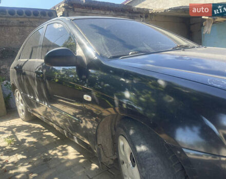 Чорний Кіа Черато, об'ємом двигуна 1.59 л та пробігом 202 тис. км за 2999 $, фото 4 на Automoto.ua