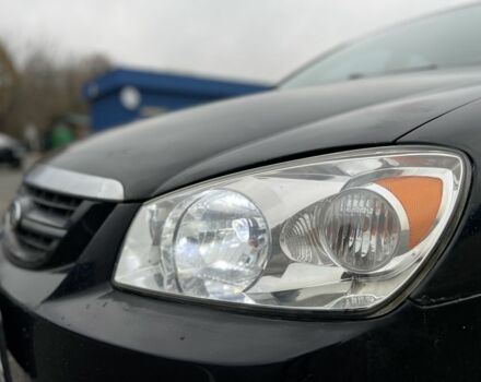 Черный Киа Черато, объемом двигателя 1.6 л и пробегом 230 тыс. км за 3200 $, фото 7 на Automoto.ua