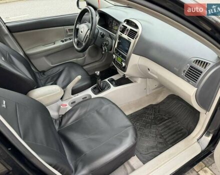 Чорний Кіа Черато, об'ємом двигуна 1.98 л та пробігом 177 тис. км за 3950 $, фото 2 на Automoto.ua