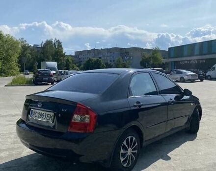 Черный Киа Черато, объемом двигателя 1.6 л и пробегом 391 тыс. км за 3800 $, фото 14 на Automoto.ua