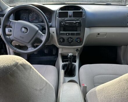 Черный Киа Черато, объемом двигателя 1.6 л и пробегом 245 тыс. км за 2850 $, фото 9 на Automoto.ua