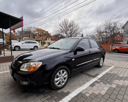 Черный Киа Черато, объемом двигателя 1.6 л и пробегом 232 тыс. км за 4300 $, фото 11 на Automoto.ua