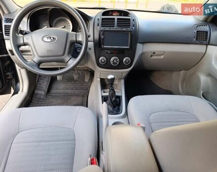 Чорний Кіа Черато, об'ємом двигуна 1.6 л та пробігом 237 тис. км за 5300 $, фото 29 на Automoto.ua