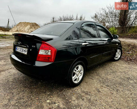 Чорний Кіа Черато, об'ємом двигуна 1.98 л та пробігом 240 тис. км за 5100 $, фото 4 на Automoto.ua