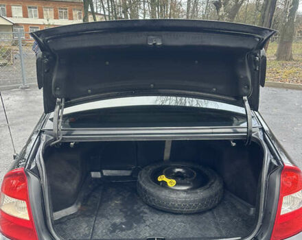 Черный Киа Черато, объемом двигателя 1.98 л и пробегом 236 тыс. км за 4100 $, фото 18 на Automoto.ua