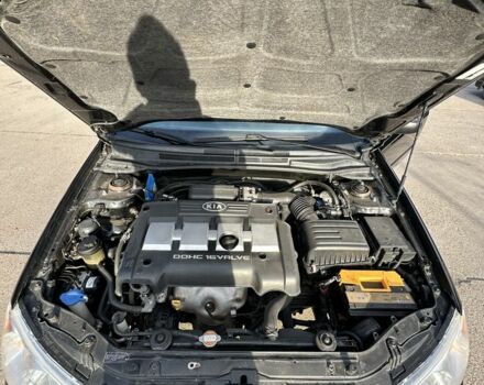 Черный Киа Черато, объемом двигателя 1.6 л и пробегом 245 тыс. км за 2850 $, фото 6 на Automoto.ua