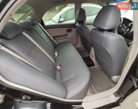 Черный Киа Черато, объемом двигателя 1.59 л и пробегом 203 тыс. км за 4400 $, фото 8 на Automoto.ua