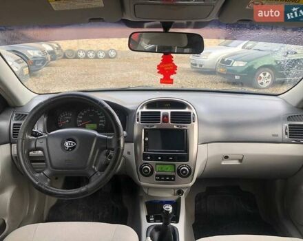 Чорний Кіа Черато, об'ємом двигуна 2 л та пробігом 177 тис. км за 4399 $, фото 26 на Automoto.ua