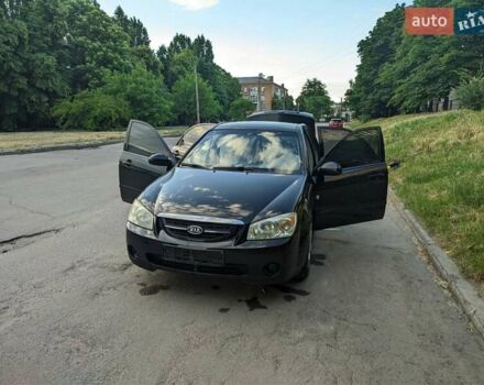 Чорний Кіа Черато, об'ємом двигуна 1.5 л та пробігом 221 тис. км за 4200 $, фото 9 на Automoto.ua