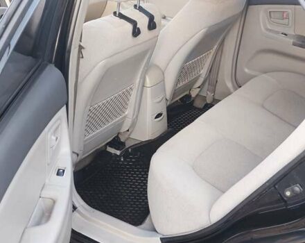 Черный Киа Черато, объемом двигателя 1.6 л и пробегом 230 тыс. км за 4250 $, фото 7 на Automoto.ua