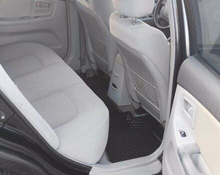 Черный Киа Черато, объемом двигателя 1.6 л и пробегом 230 тыс. км за 4250 $, фото 6 на Automoto.ua